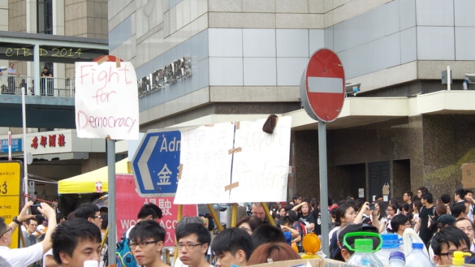 The contrast of signs on HK streets Sep. 29, 2014